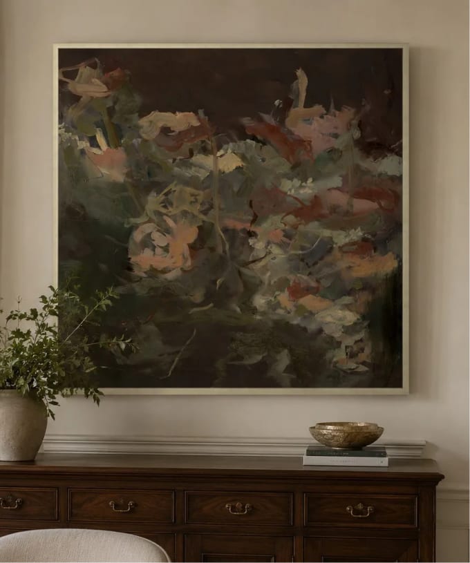 Large abstract floral painting above a dark wood console